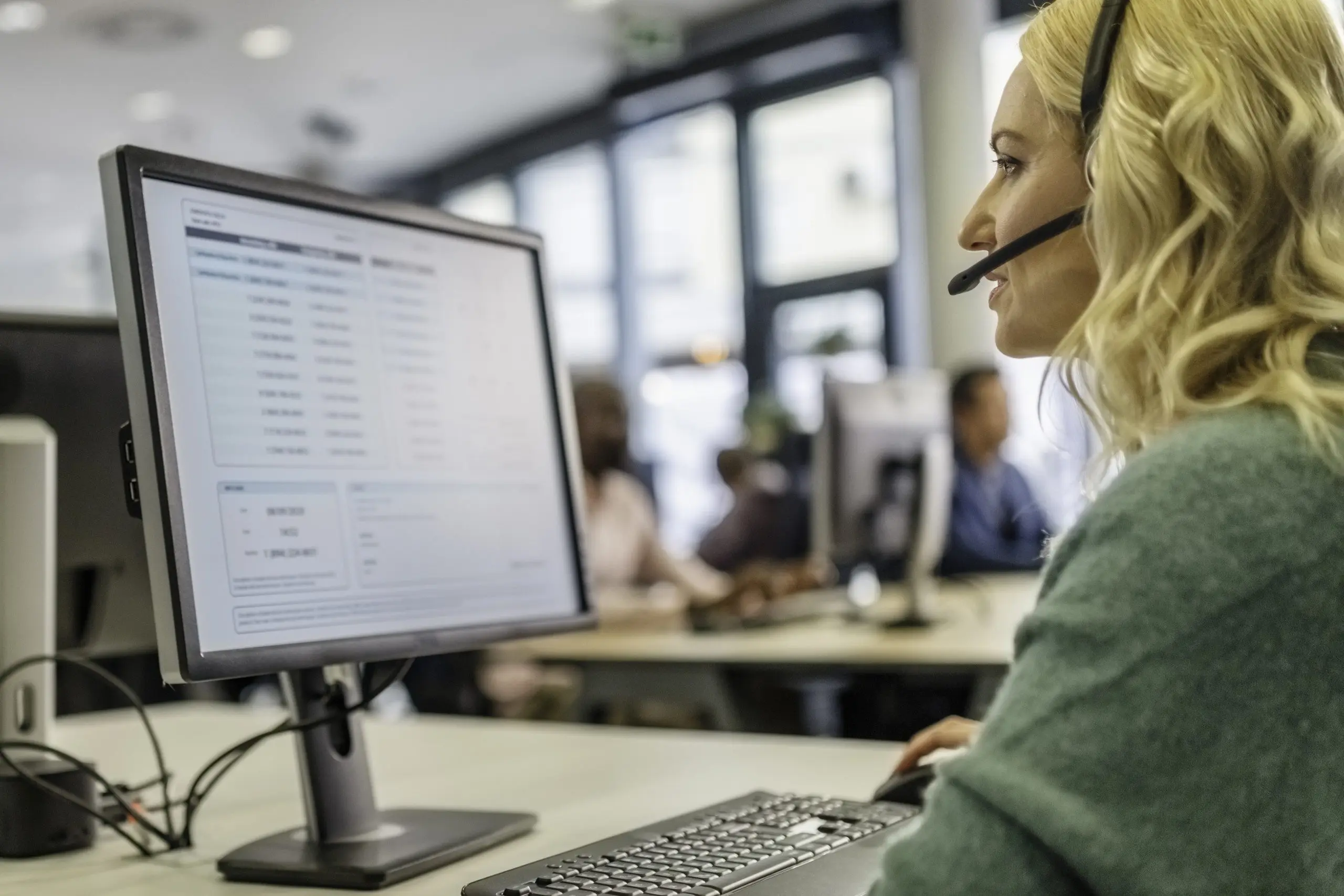 Woman working in a call center, customer service