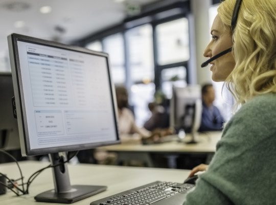 Woman working in a call center, customer service
